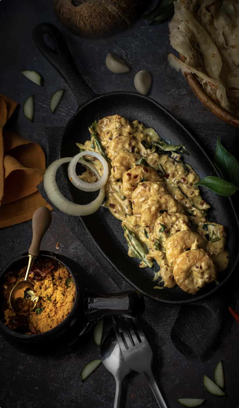 Kerala chicken prepared with a creamy spiced sauce and curry leaves